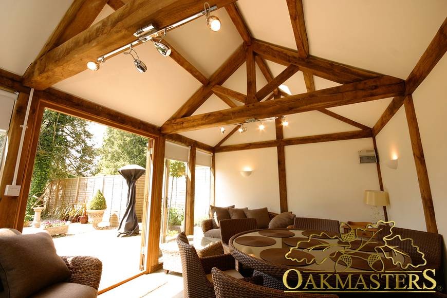 This is an example of a traditional sunroom in Sussex.