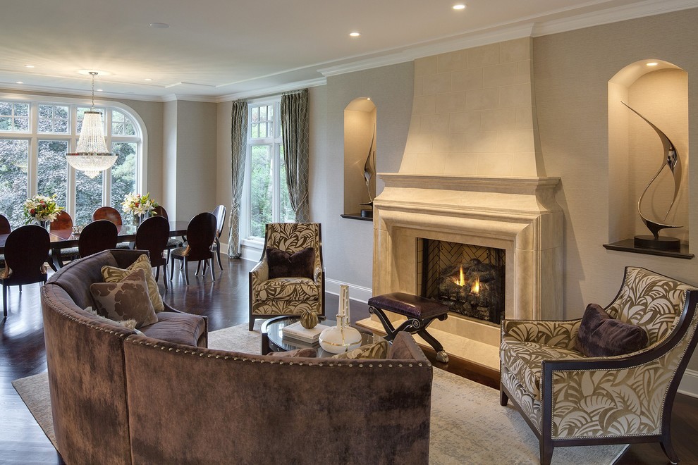 Example of a classic formal and open concept dark wood floor living room design in Minneapolis with gray walls, a standard fireplace and no tv