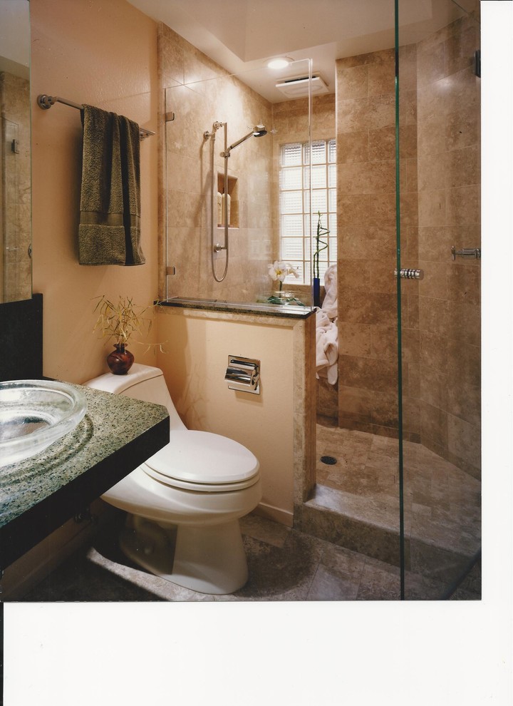 Photo of a mid-sized contemporary 3/4 bathroom in San Francisco with a corner shower, a one-piece toilet, beige tile and beige walls.