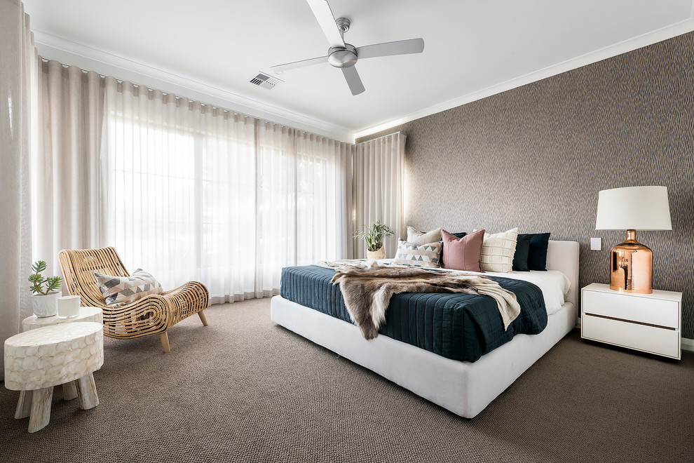 Photo of a large modern master bedroom in Perth with white walls and carpet.