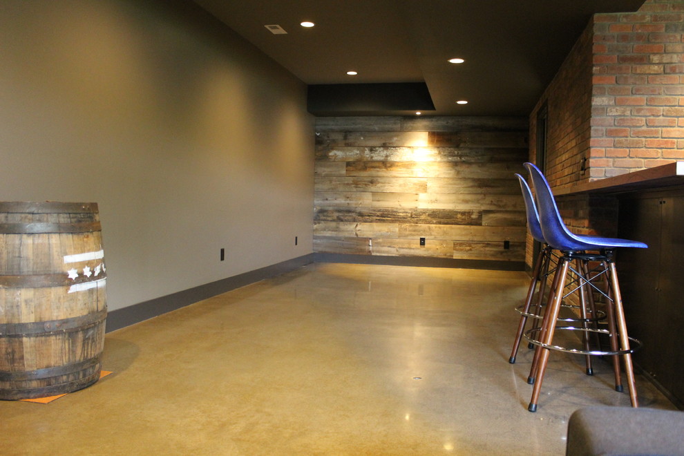 This is an example of a mid-sized modern look-out basement in Other with beige walls, concrete floors and yellow floor.