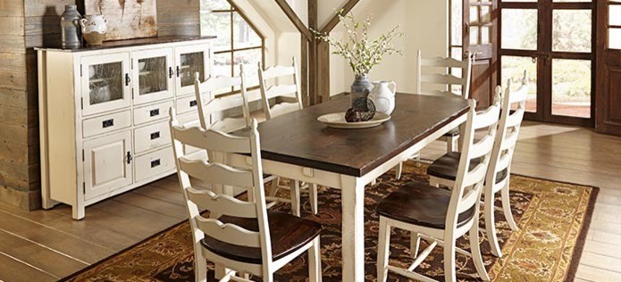 Photo of a mid-sized country separate dining room in San Diego with white walls, dark hardwood floors and no fireplace.