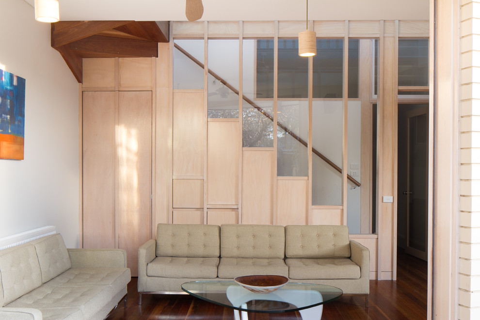 This is an example of a mid-sized contemporary family room in Melbourne.