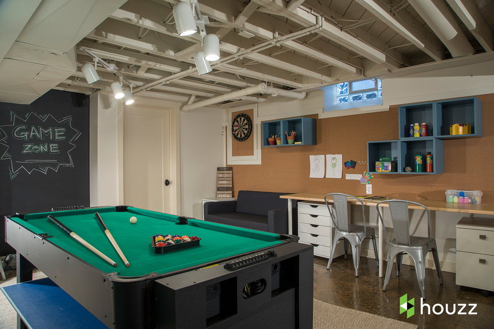 Small transitional fully buried basement in Detroit with concrete floors, brown floor, multi-coloured walls and a game room.