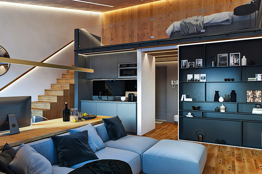 Интерьер небольшой двухуровневой квартиры студии в стиле лофт