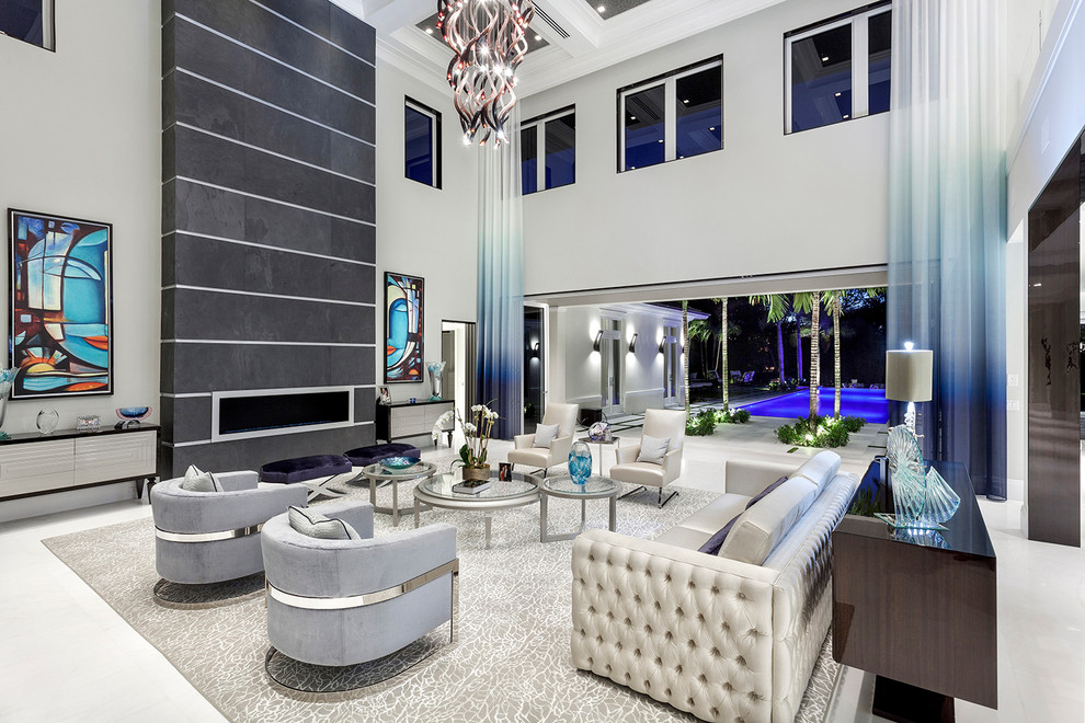 Design ideas for an expansive contemporary enclosed living room in Miami with white walls, ceramic floors, a ribbon fireplace, a metal fireplace surround, no tv and white floor.