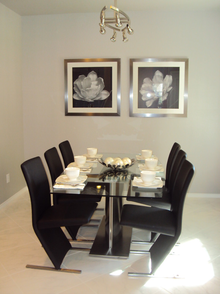 Idee per una sala da pranzo minimal di medie dimensioni con pavimento con piastrelle in ceramica