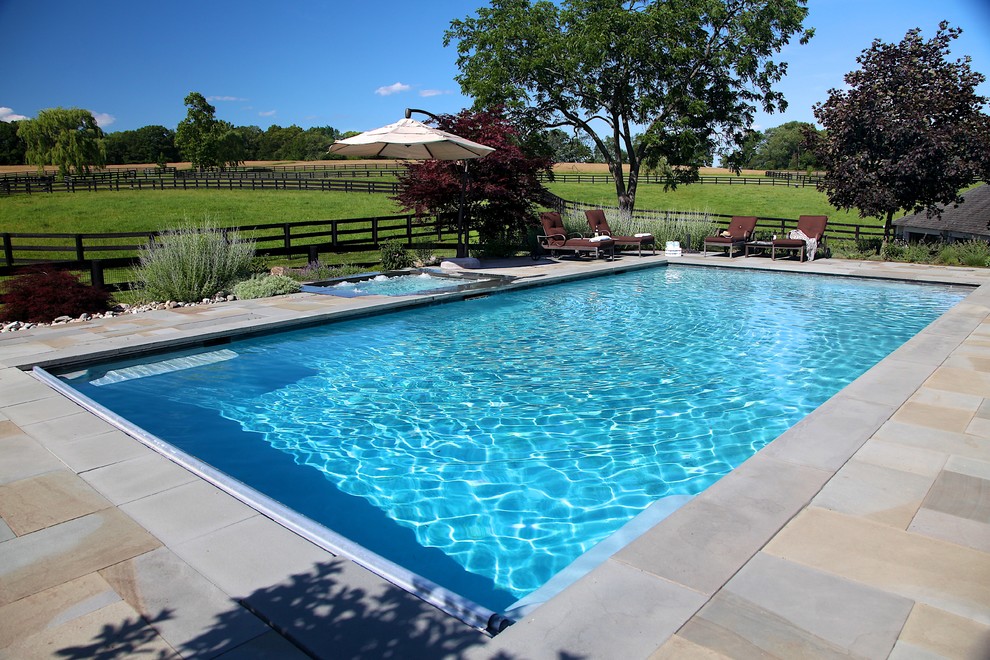 Inspiration for a timeless pool remodel in New York
