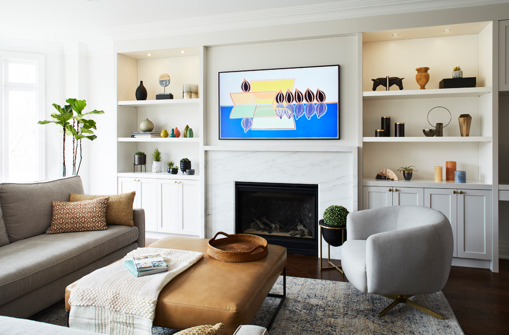 Example of a mid-sized transitional open concept dark wood floor home design design in Toronto with white walls, a stone fireplace and a media wall