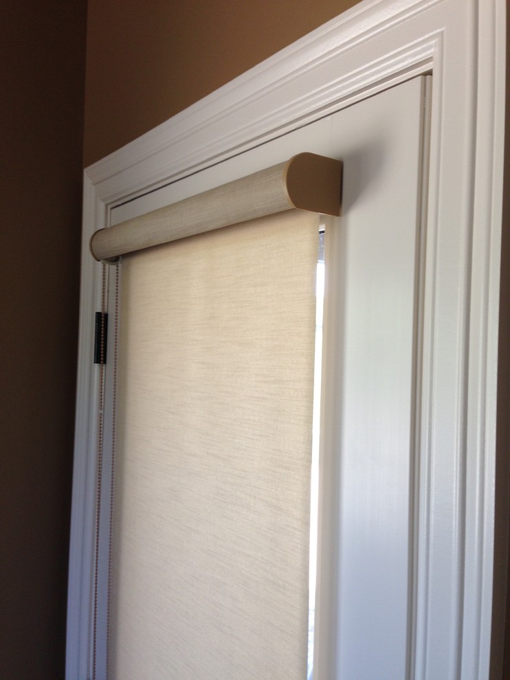Transitional entryway photo in Omaha with a white front door