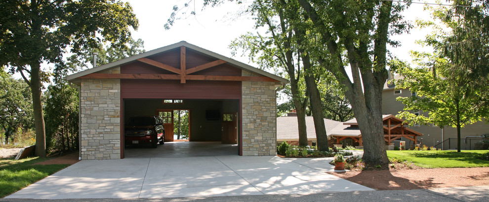 Inspiration for a large arts and crafts detached two-car garage in Milwaukee.