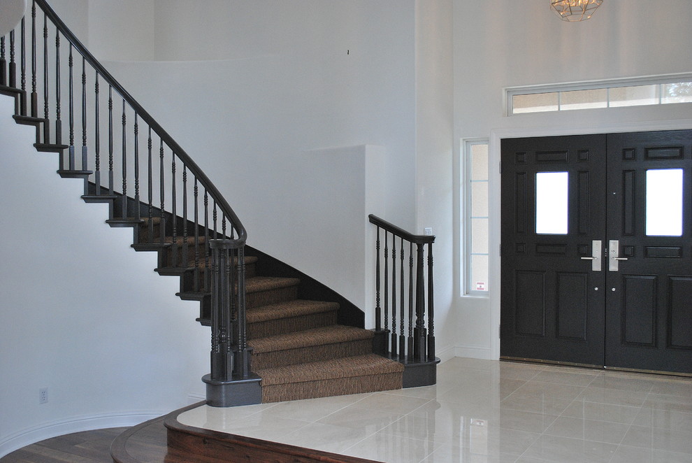 Mid-sized contemporary foyer in San Francisco with white walls, a double front door and a black front door.
