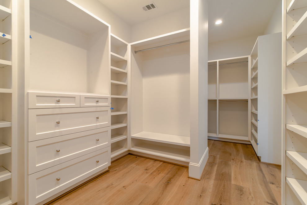 Example of a transitional closet design in Houston