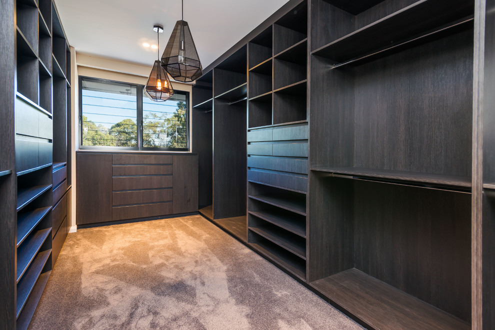 This is an example of a contemporary storage and wardrobe in Gold Coast - Tweed.