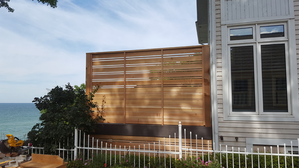 Deck - mid-sized transitional deck idea in Toronto