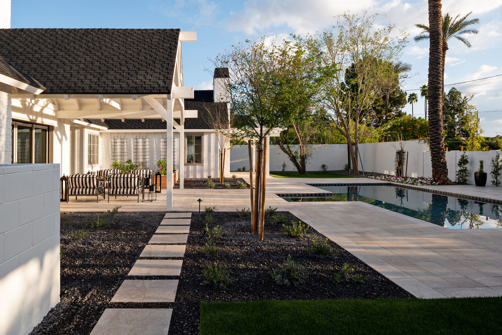 Example of a transitional exterior home design in Phoenix