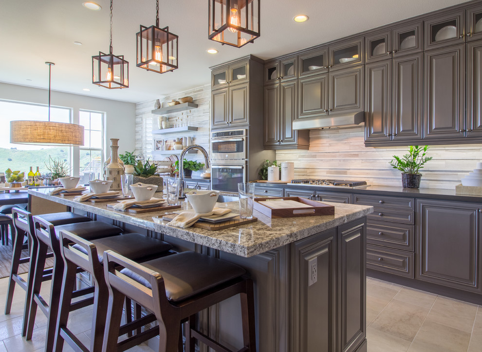 Inspiration for a large asian galley eat-in kitchen in Orange County with a double-bowl sink, raised-panel cabinets, grey cabinets, granite benchtops, beige splashback, timber splashback, stainless steel appliances, ceramic floors and with island.