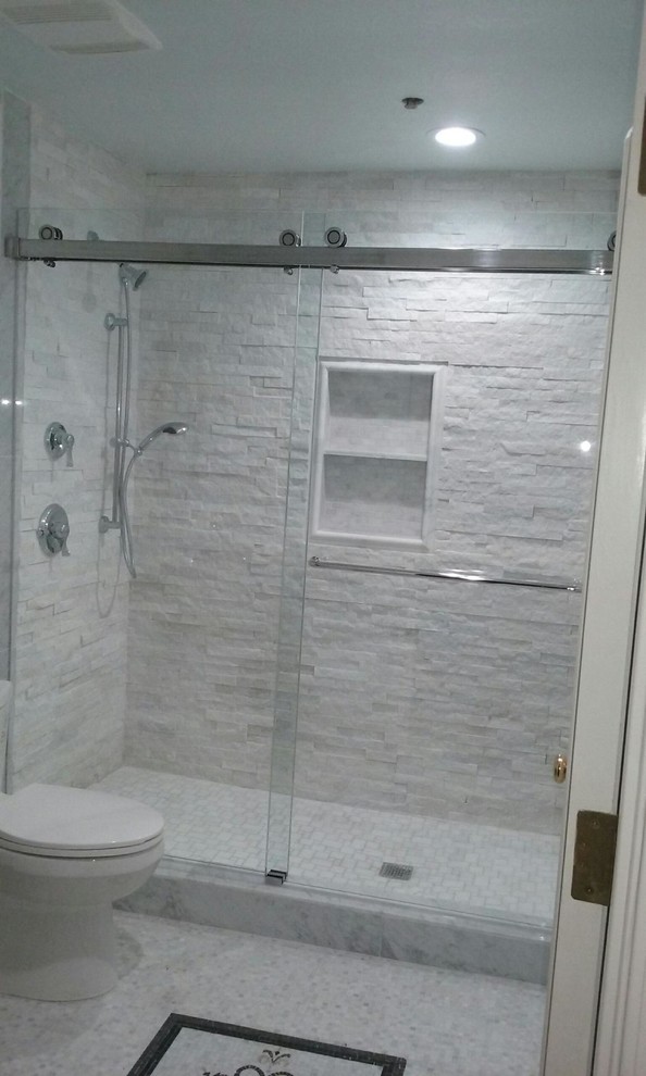 This is an example of a mid-sized modern master bathroom in Orange County with an open shower, white tile, mosaic tile, white walls, white cabinets and limestone benchtops.