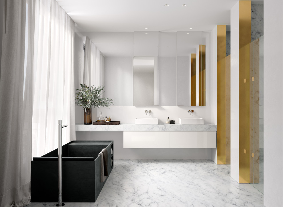 Photo of a large contemporary master bathroom in Melbourne with recessed-panel cabinets, white cabinets, a freestanding tub, white walls, marble floors, a vessel sink, marble benchtops, a hinged shower door, a double vanity and a floating vanity.