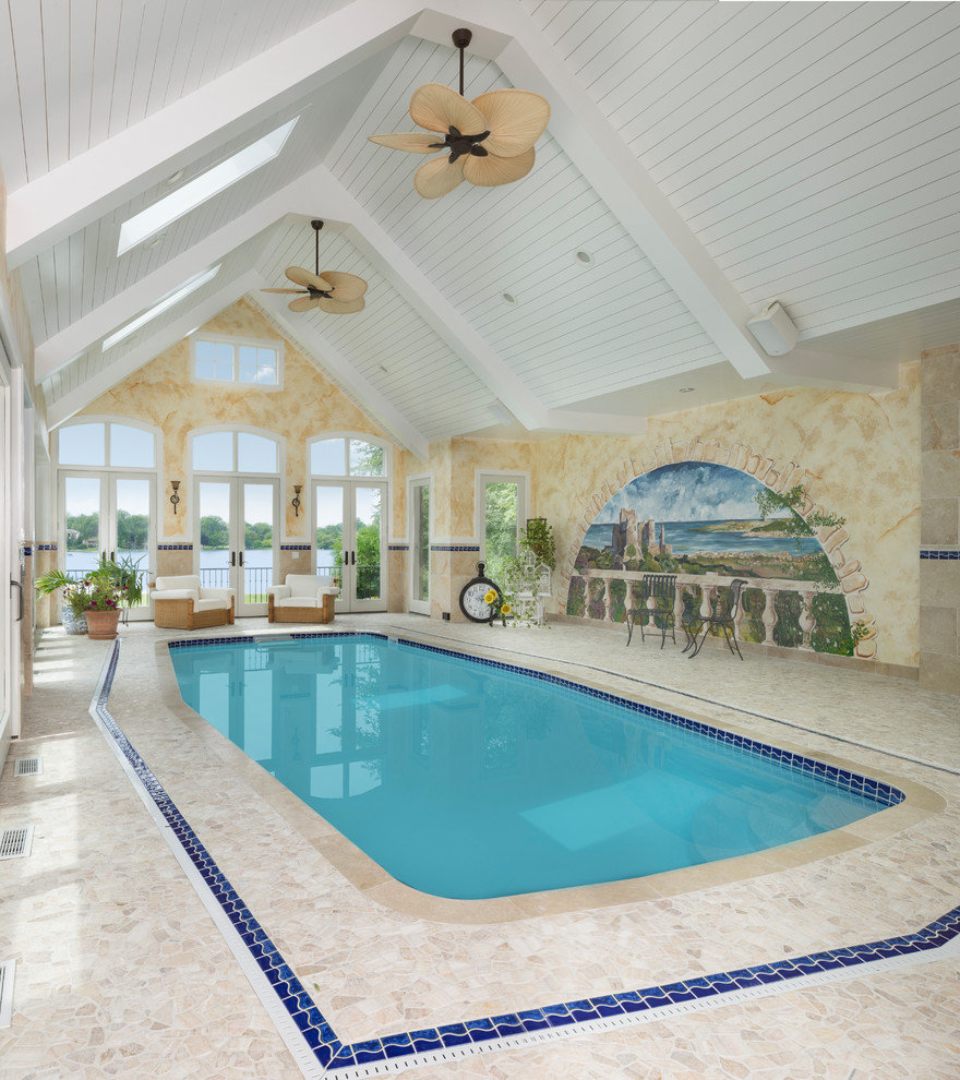 Photo of a mediterranean indoor custom-shaped lap pool in Detroit with a pool house.