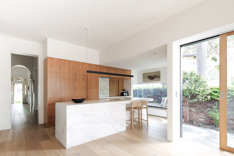 Inspiration for a contemporary kitchen in Melbourne with light hardwood floors.