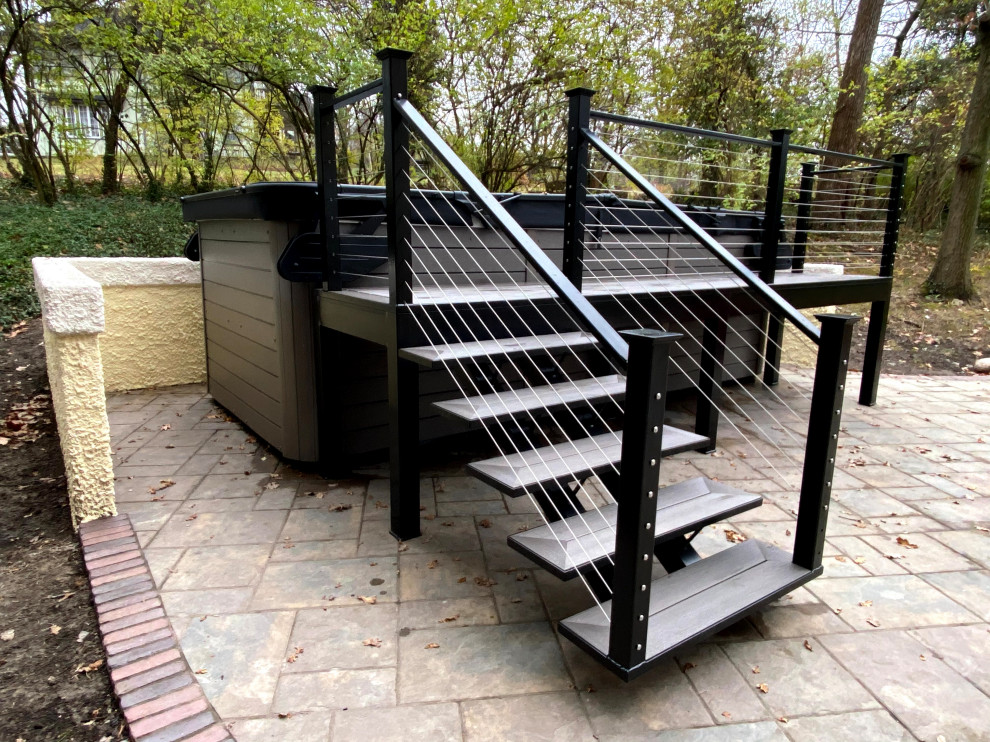 Design ideas for a small modern back ground level metal railing terrace in Cincinnati with no cover.