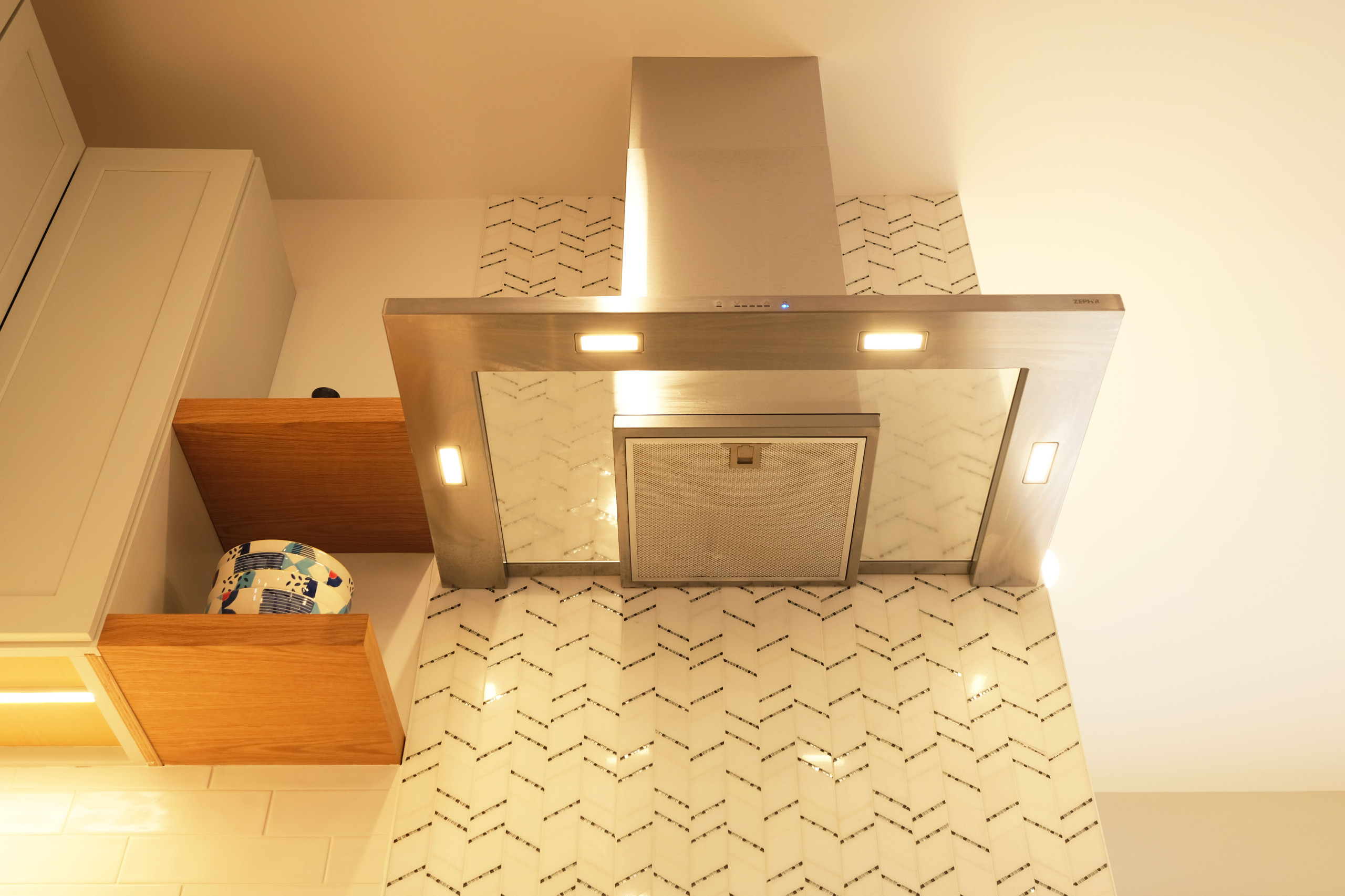 Contemporary Navy Kitchen with Brass Accents