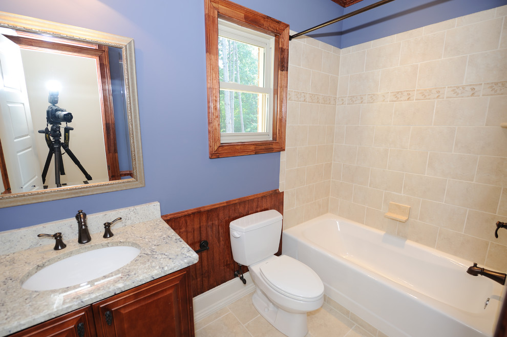 Design ideas for a traditional powder room in Raleigh.