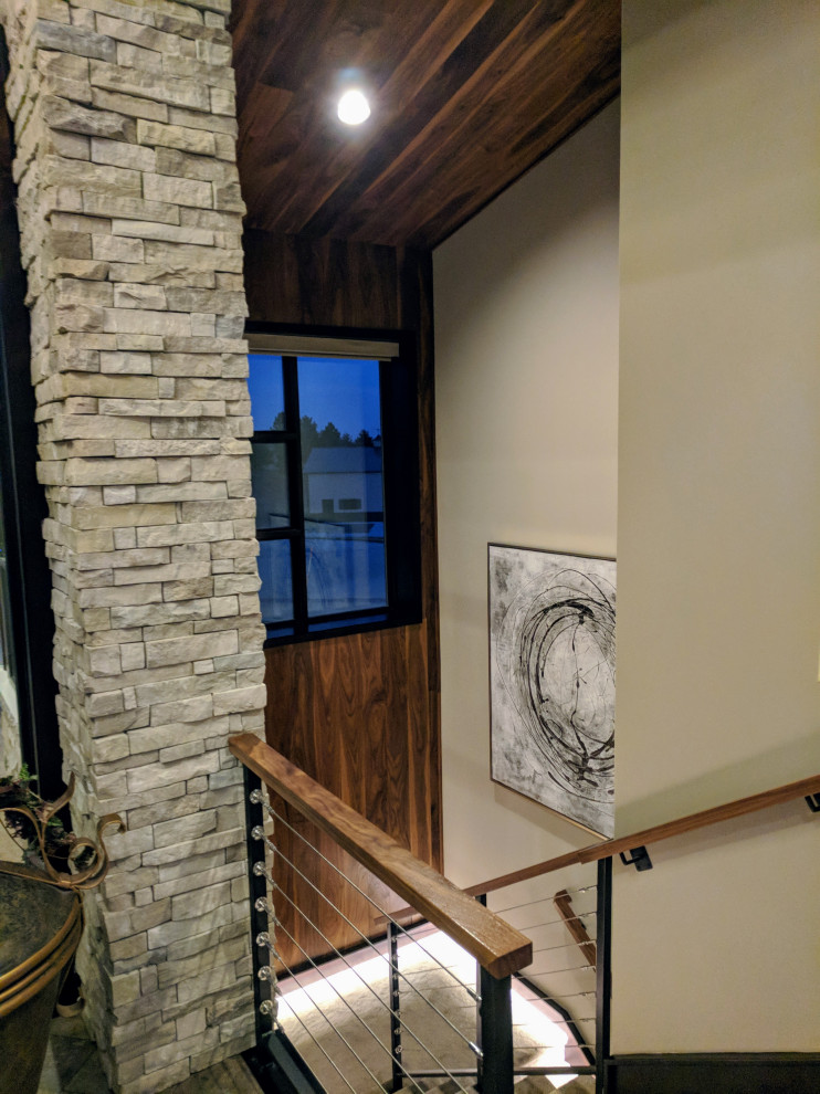 This is an example of an expansive transitional staircase in Omaha.
