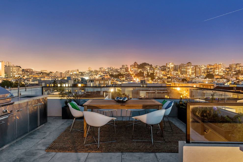 Photo of a contemporary rooftop and rooftop deck in San Francisco with a container garden and no cover.