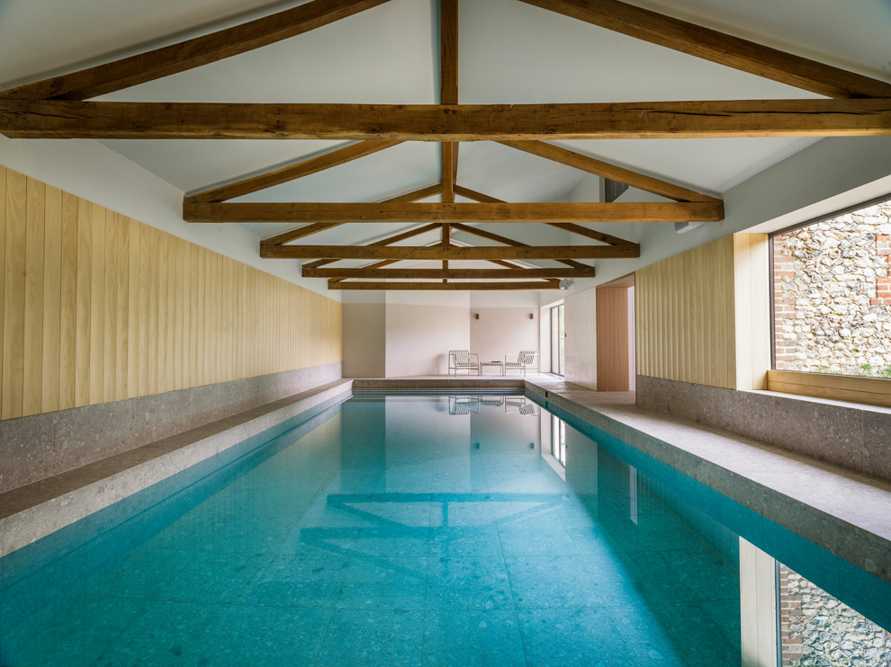 This is an example of a contemporary rectangular lap pool in London.
