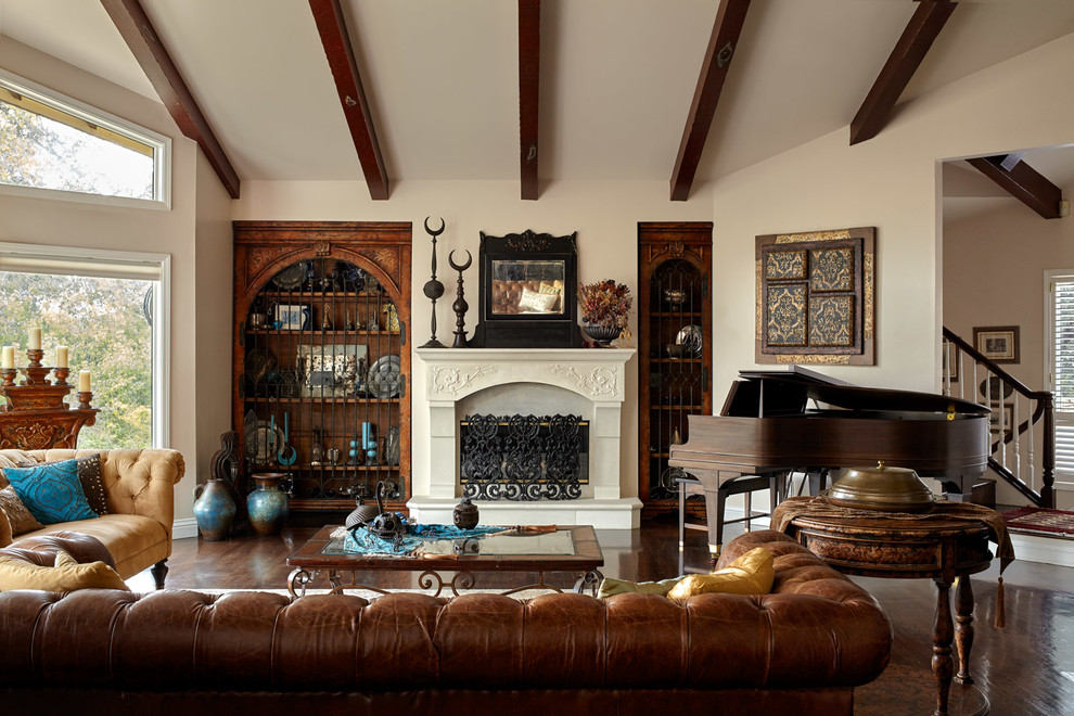 Inspiration for a traditional living room in San Francisco with a music area, beige walls, medium hardwood floors, a standard fireplace and brown floor.