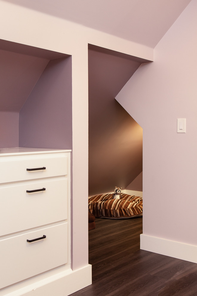 Small modern master bedroom in Portland with purple walls, vinyl floors and grey floor.