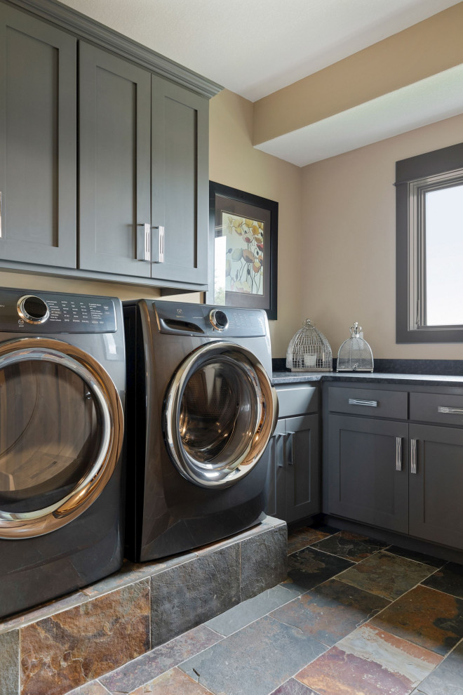 This is an example of a transitional laundry room in Minneapolis.