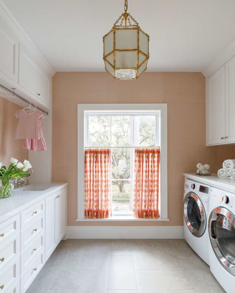 Traditional laundry room in Houston.