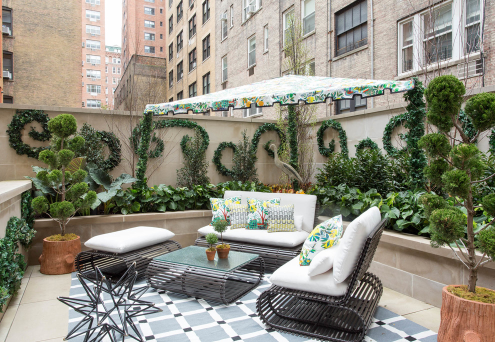 Design ideas for an eclectic patio in New York with a vertical garden and a gazebo/cabana.