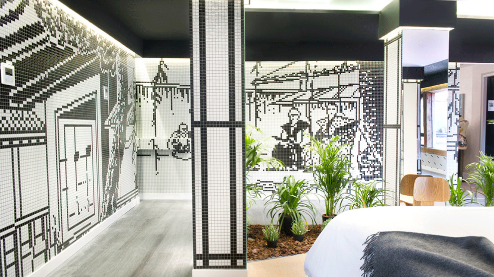 Design ideas for an expansive asian loft-style bedroom in Madrid with black walls.