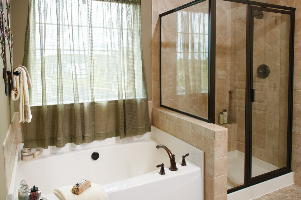 Transitional master beige tile bathroom photo with a hot tub