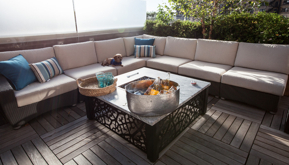 Design ideas for a large contemporary rooftop deck in Chicago with a fire feature and no cover.