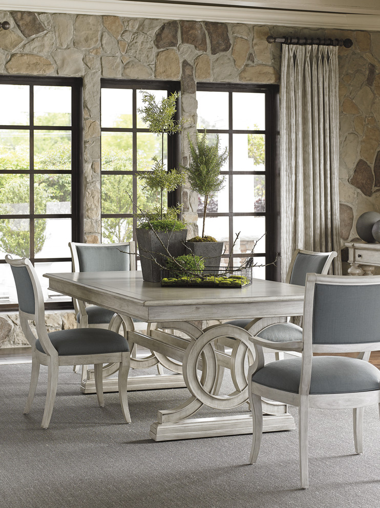 Contemporary open plan dining in Charleston with beige walls, light hardwood floors and beige floor.