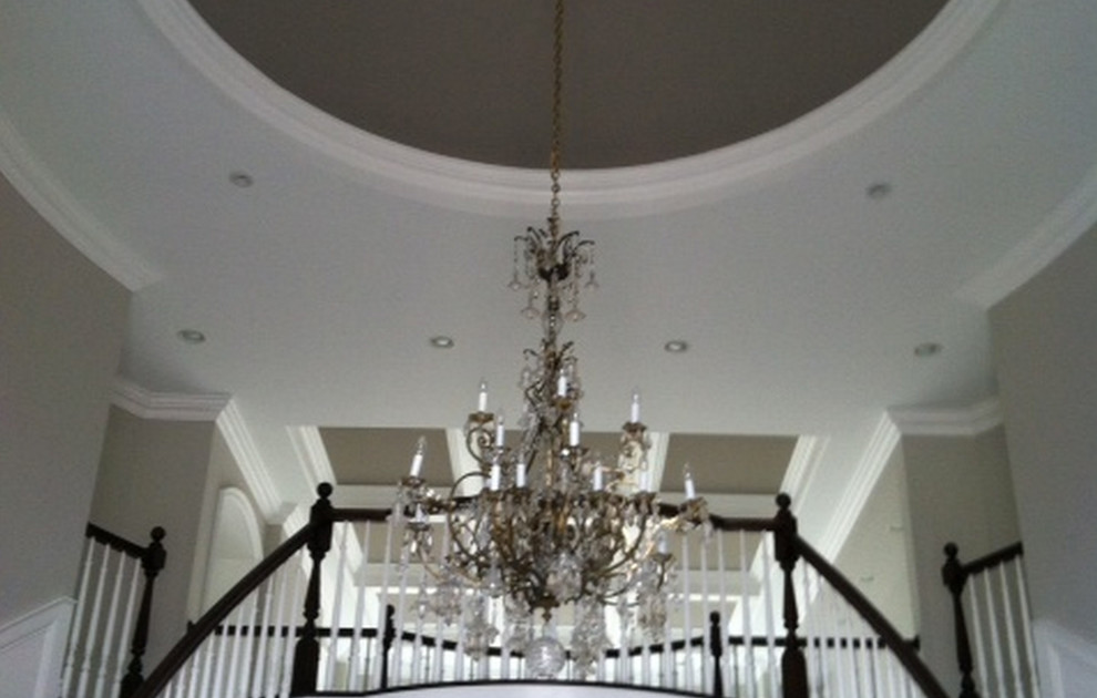 Large transitional foyer photo in Columbus with beige walls