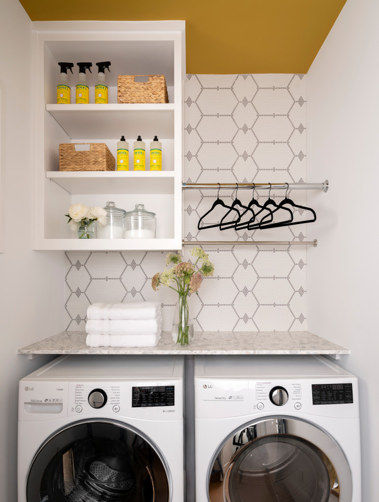Example of a transitional laundry room design in Austin