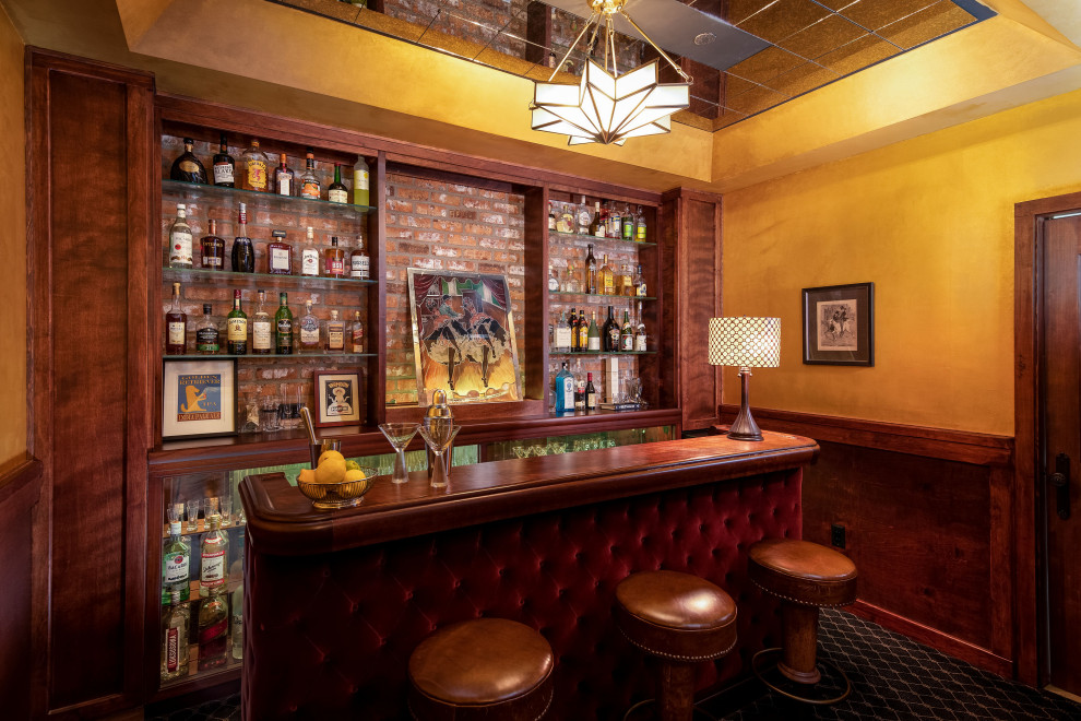 Inspiration for a traditional seated home bar in Seattle.