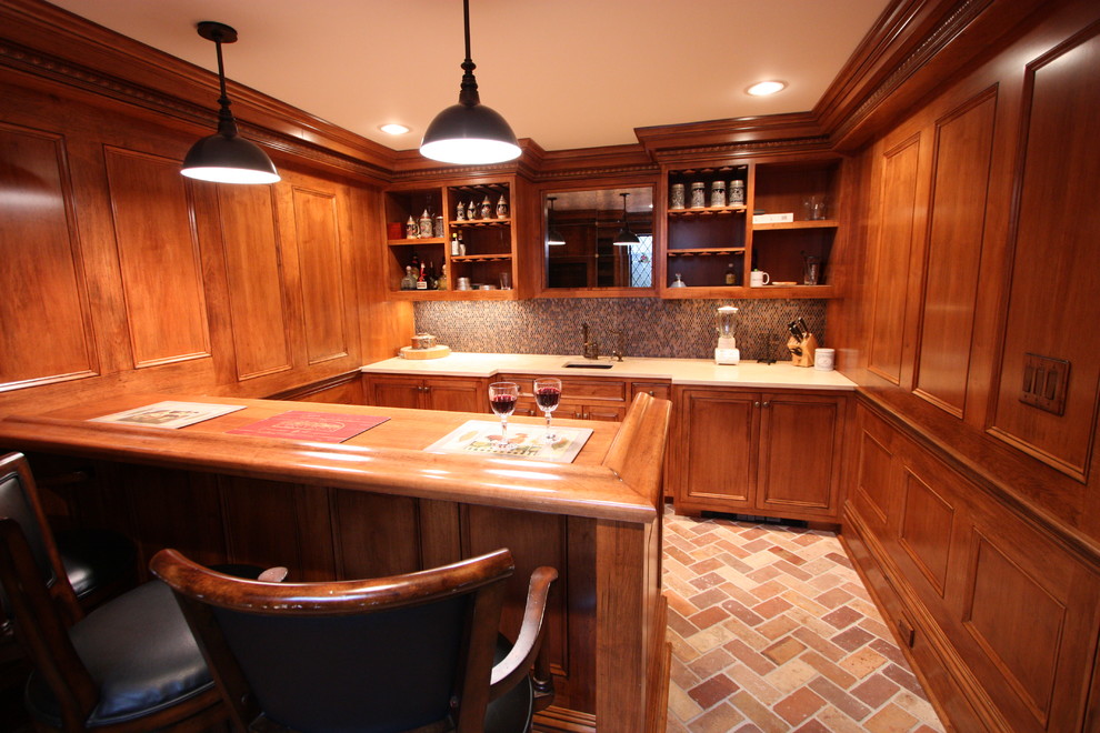 Example of a mid-sized classic terra-cotta tile basement design
