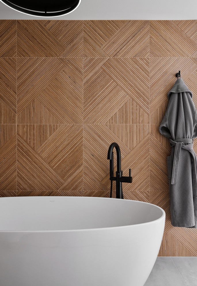 Doorless shower - large scandinavian master gray tile and marble tile double-sink doorless shower idea in Chicago with flat-panel cabinets, light wood cabinets, white walls, quartz countertops, a hinged shower door, white countertops and a built-in vanity