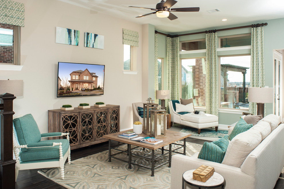 Inspiration for a mid-sized transitional open concept living room in Dallas with beige walls, dark hardwood floors, no fireplace and a wall-mounted tv.