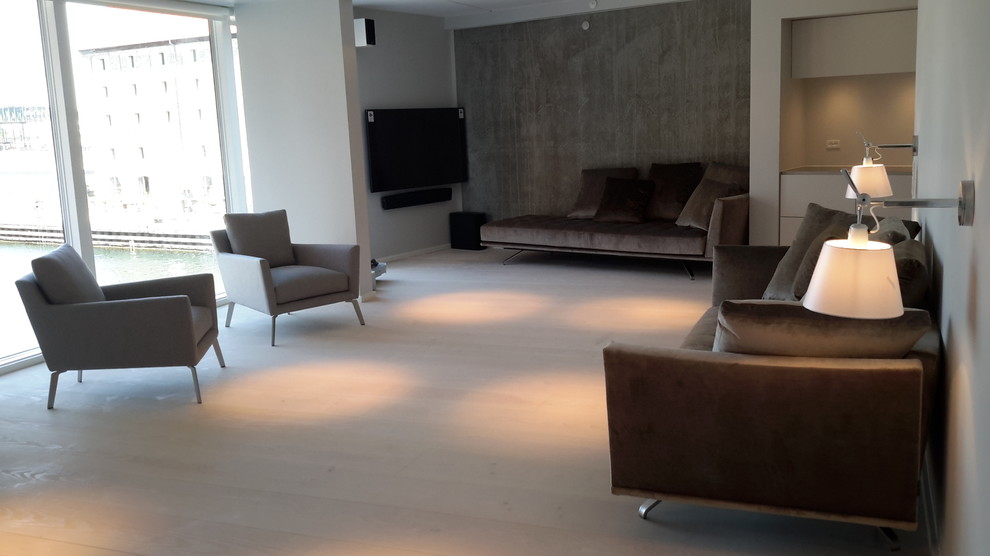 Modern living room in Copenhagen with grey walls.