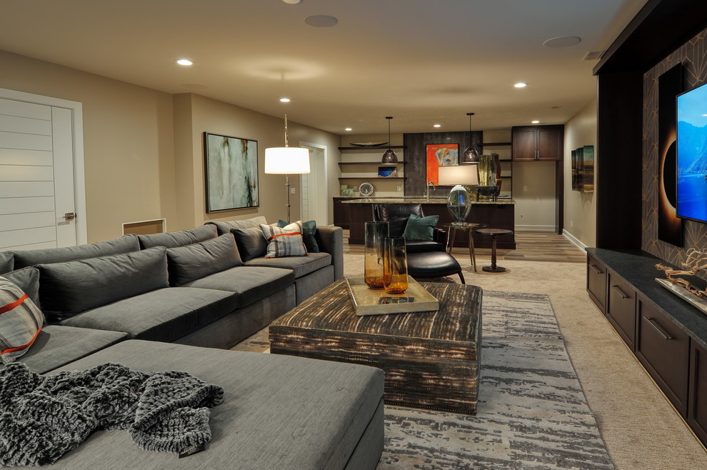 This is an example of a mid-sized midcentury look-out basement in Omaha with beige walls, carpet, no fireplace and beige floor.