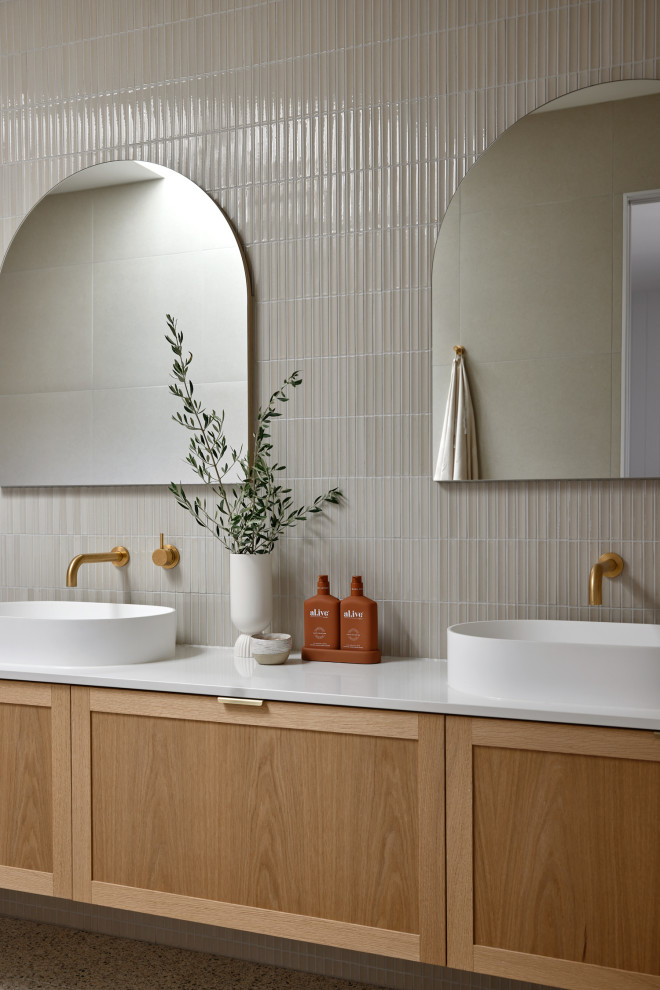 Design ideas for a beach style bathroom in Gold Coast - Tweed with a double vanity.