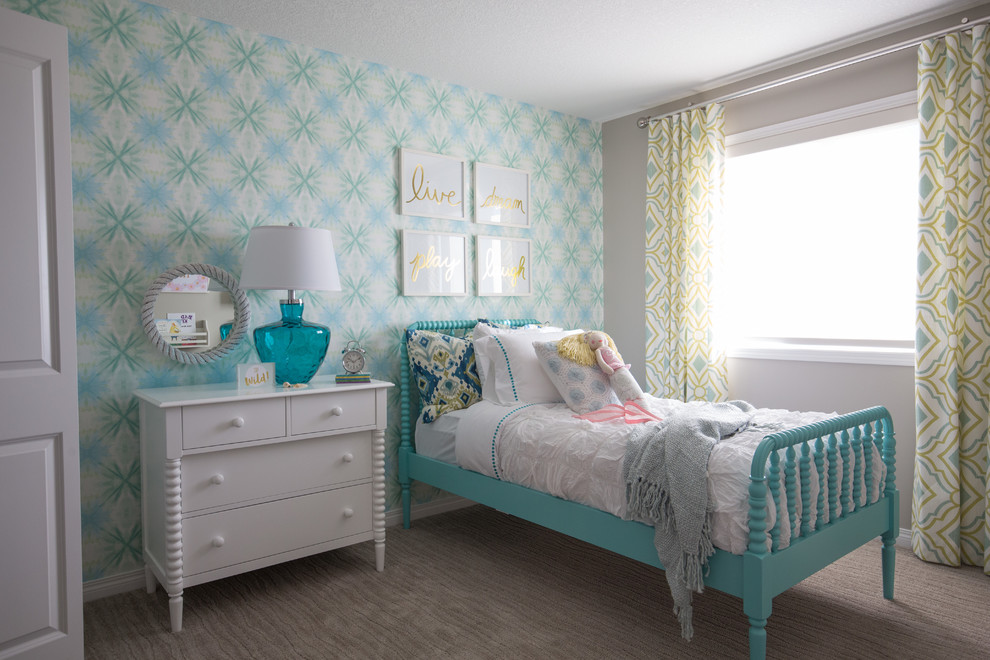 This is an example of a mid-sized transitional kids' bedroom for kids 4-10 years old and girls in Calgary with grey walls and carpet.